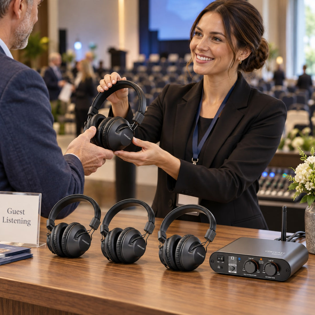 AuraPlex Pro-Lite 4 headphones being distributed for a rental event with AirCast transmitter